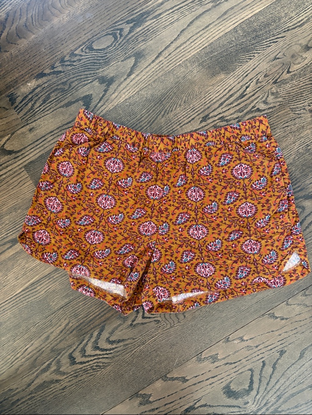 Madewell Drapey Pull-On Shorts‎ in the "Warm Paisley" burnt orange/pink print.